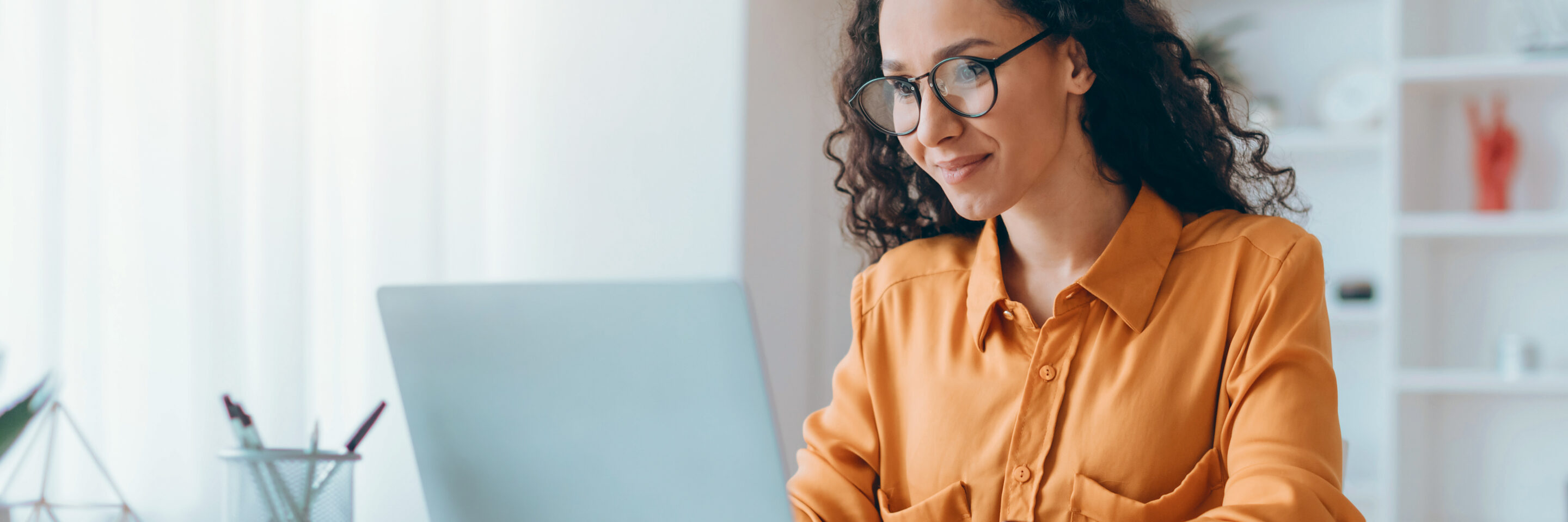 Middle Eastern Lady Using Laptop Working Online Sitting In Office